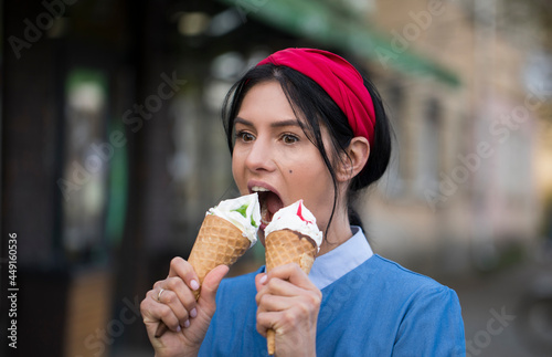 Woman eating ice cream. Happiness. Ice cream. Model. Background. Dessert. 
