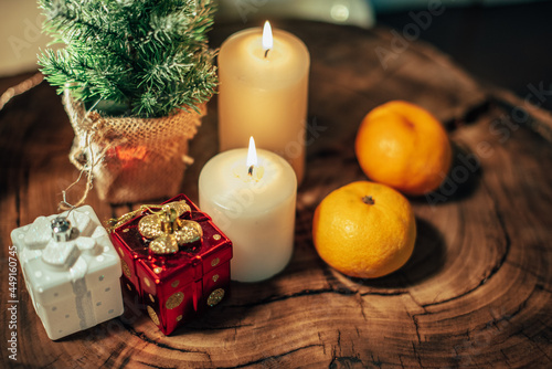 Christmas decor with candles and gifts