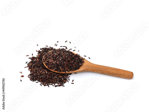 healthy brown rice in a scoop on white background