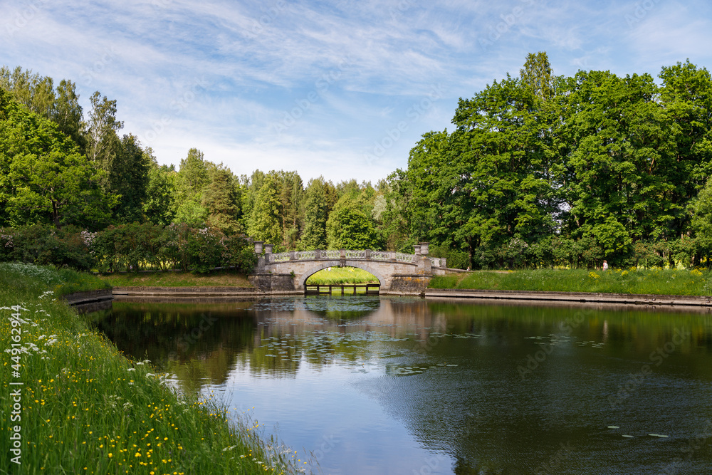 The old bridge in the Public Park in Pavlovsk The old bridge in the Public Park in Pavlovsk