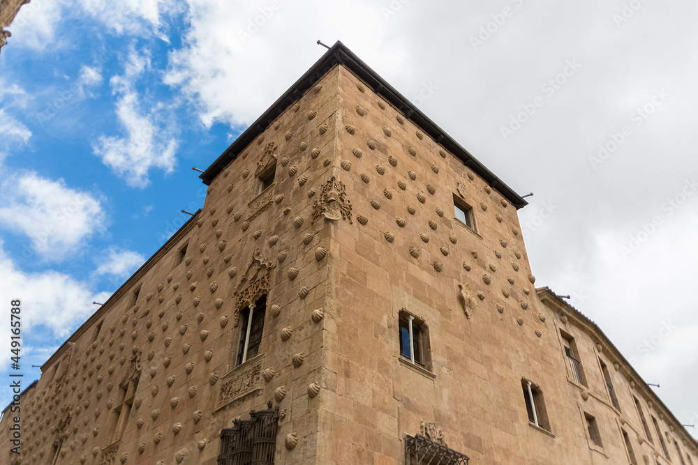 View at the later gothic facade building shell house, Casa de las Conchas, a historical building on Salamanca downtown