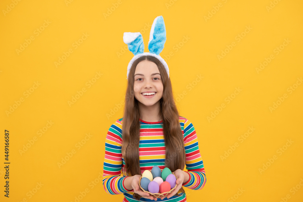happy easter teen girl in rabbit bunny ears holding painted eggs for holiday egg hunt, bunny hunt happy easter teen girl in rabbit bunny ears holding painted eggs for holiday egg hunt, bunny hunt