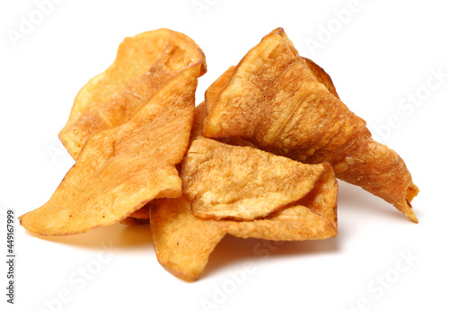Stack of beet potato chips on white background