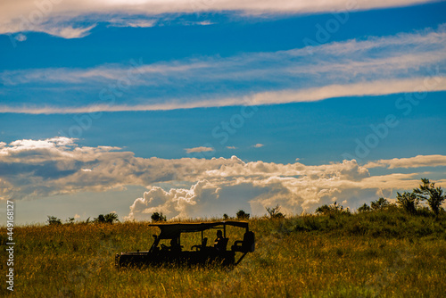 silhouette of a 4x4 vehicle in a Kenya safari