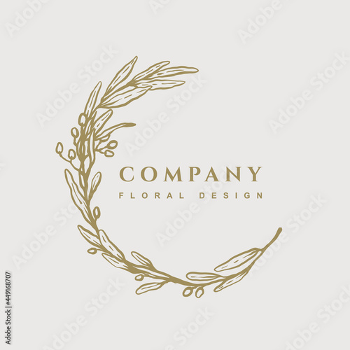 Round frame with branch of olive in gold color. Hand drawn floral logo template. Botanical trendy vector illustration for labels, logotypes, 
branding business identity, wedding invitation