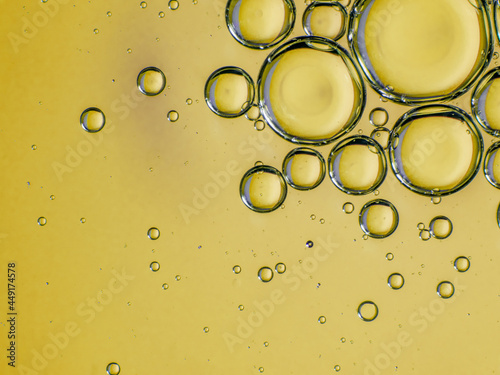 drops of oil or serum on the background of the surface