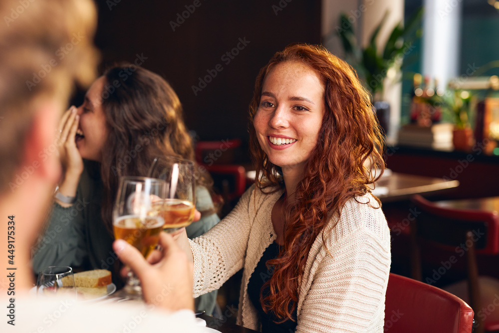 © Southworks - Woman toasting wine at dinner © Southworks - Woman toasting wine at dinner