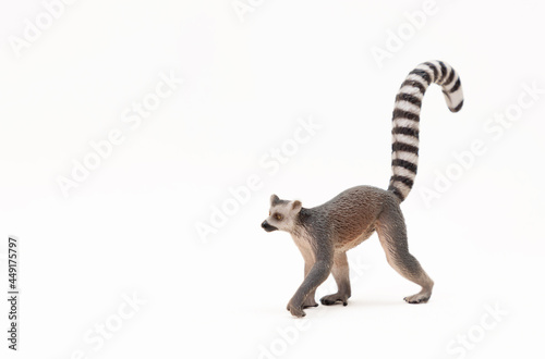 Figure of wild animal isolated on a white background. A small animal toy for children. Selective focus. Copy space