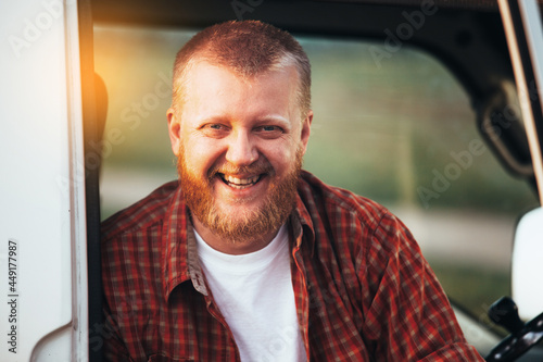 Smiling bearded driver