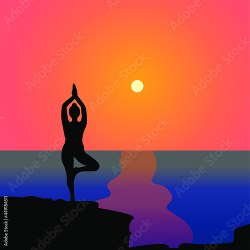 yoga and meditation on the beach and sunset view. keeping balance