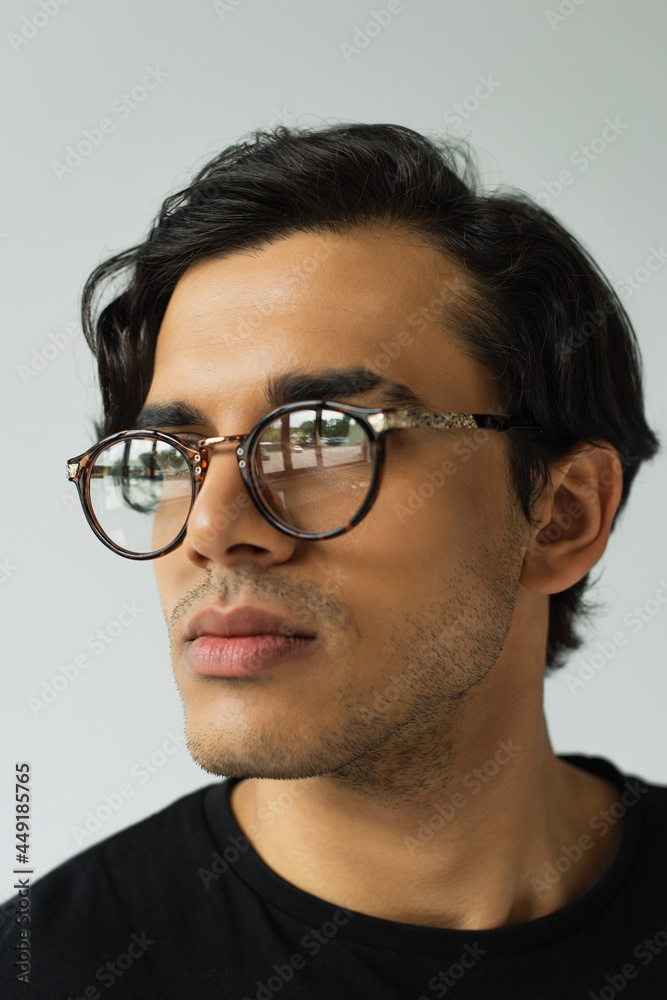 portrait of stylish man in eyeglasses isolated on grey portrait of stylish man in eyeglasses isolated on grey