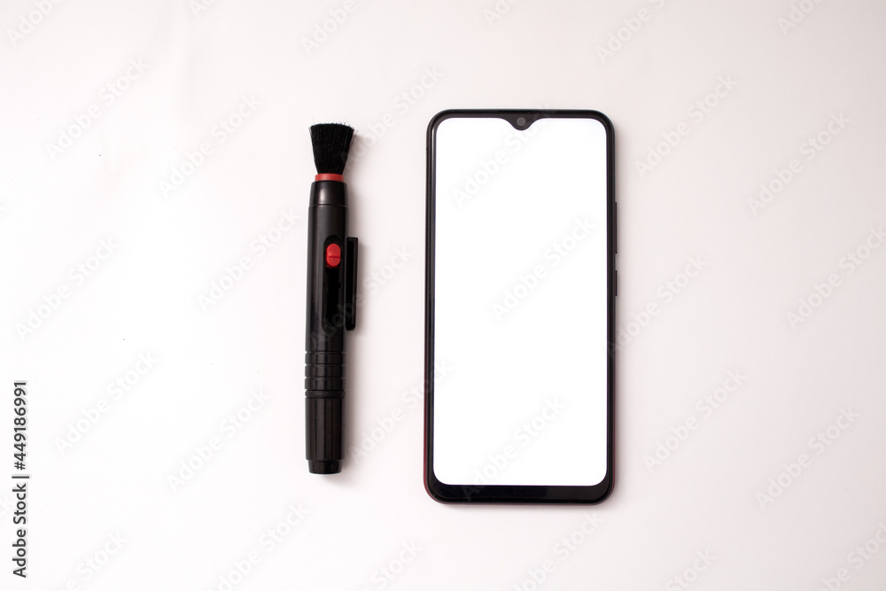 phone and cleaner on white background phone and cleaner on white background