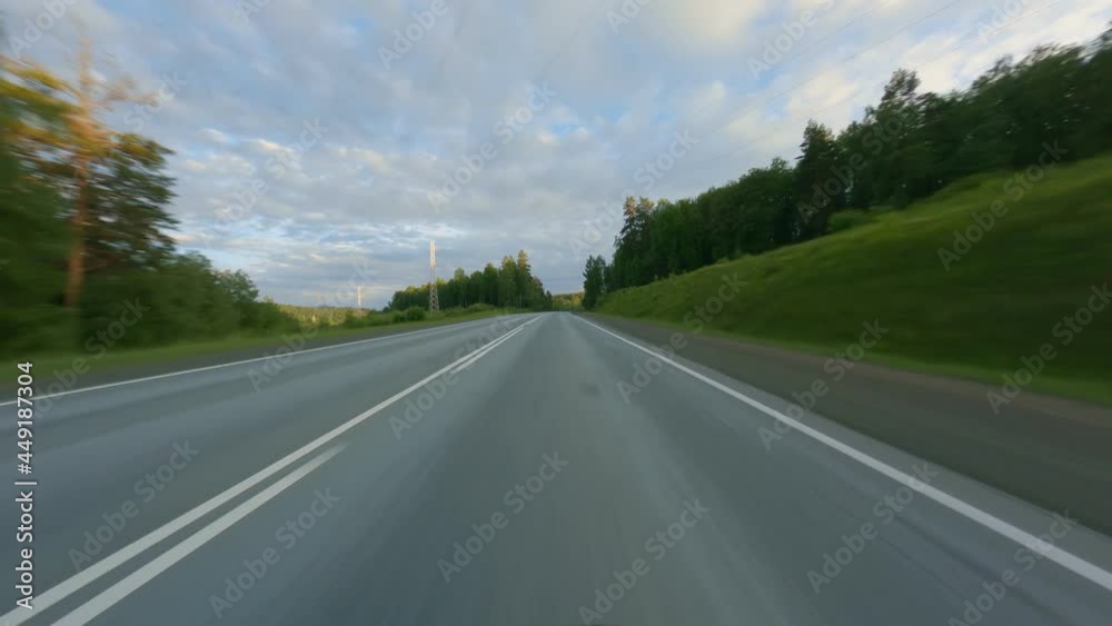 The car passes between two hills covered with dense vegetation. countryside. Several cars are coming towards us. Compliance with security measures. High quality. 4k footage. The car passes between two hills covered with dense vegetation. countryside. Several cars are coming towards us. Compliance with security measures. High quality. 4k footage.