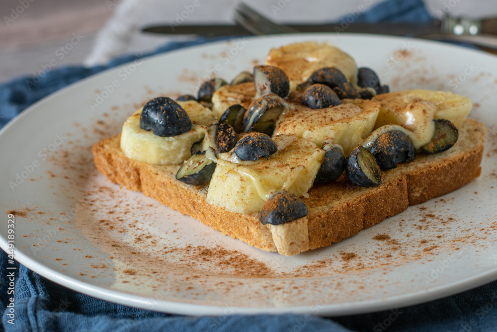 Sweet sandwich toast with banana , blueberries, almond butter and cinnamon Sweet sandwich toast with banana , blueberries, almond butter and cinnamon