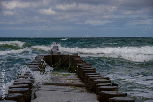 Wooden groynes in the rough Baltic Sea on the Fischland-Darss-Zingst peninsula
