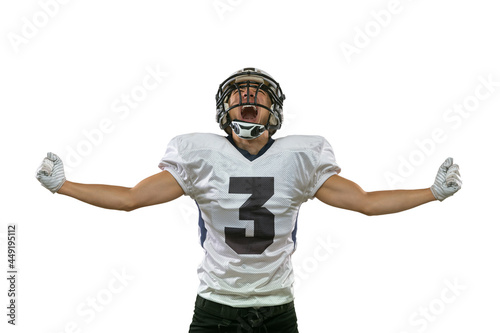 Winner, champion. Portrait of American football player training isolated on white studio background with green grass. Concept of sport, competition