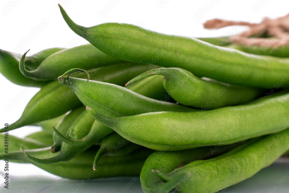 Several ripe green beans, close-up, isolated on white. Several ripe green beans, close-up, isolated on white.
