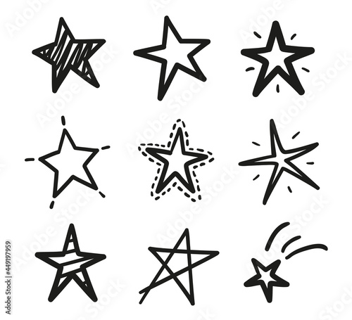 Hand drawn black outline stars on isolated white background. Freehand simple symbols. Black and white illustration