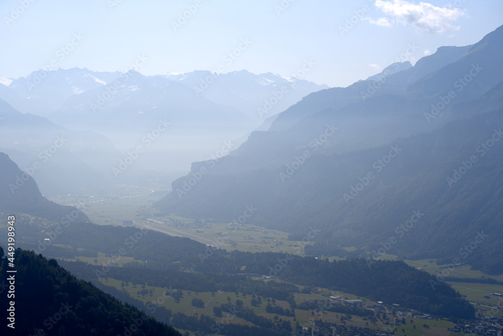 Panoramic view of Haslital (Hasli Valley) from mountain Brienzer Rothorn at Bernese Highland on a beautiful sunny summer day. Photo taken July 21st, Flühli, Switzerland.