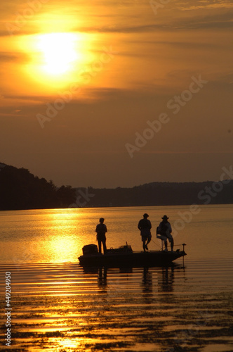 Bass fishermen at sunset 