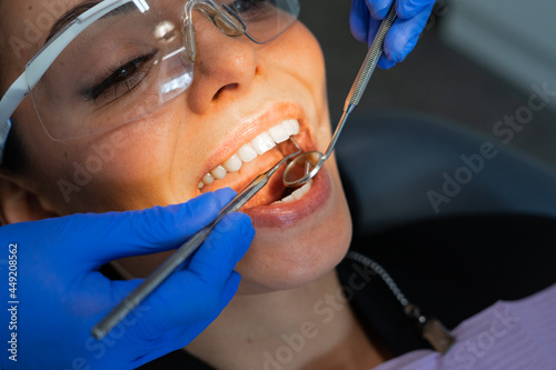 Beautiful women in the dentist's chair. happy to do examination and treatment at the dentist