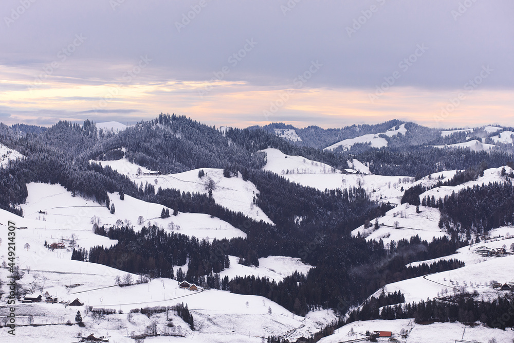 Landscape with alps mounteins with snow by the winter, sunset sky.