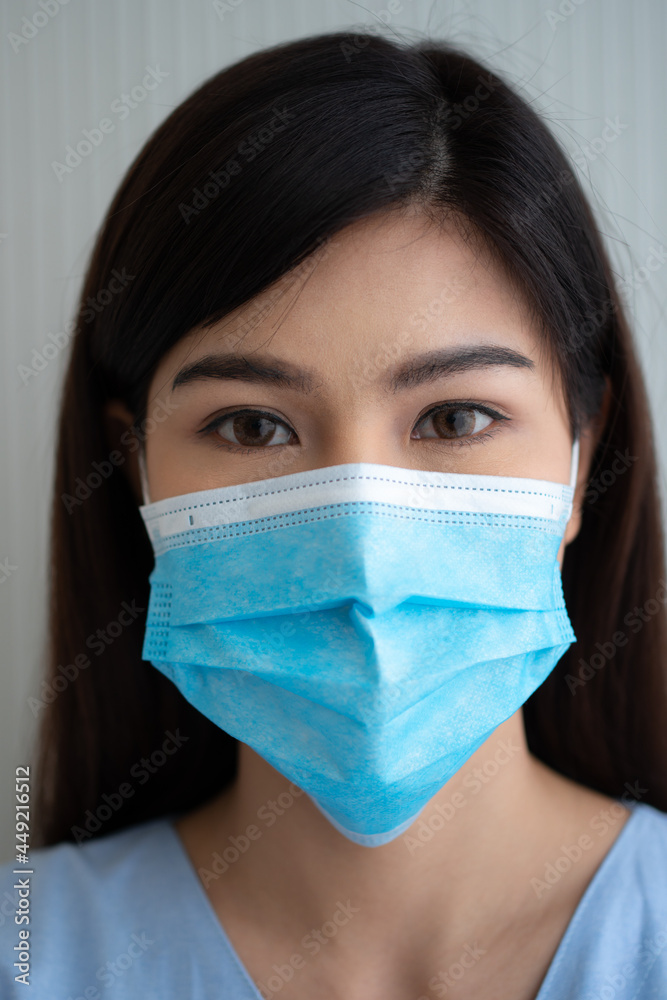 Portrait of Asian woman patient in the hospital. Concept of Staying up and resting in the hospital Portrait of Asian woman patient in the hospital. Concept of Staying up and resting in the hospital