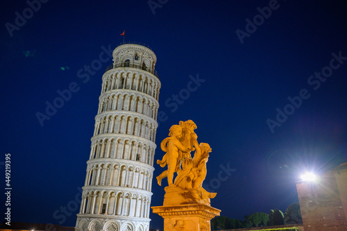 leaning tower of Pisa with Fontana dei Putti on Piazza dei Miracoli in Pisa during the blue hour