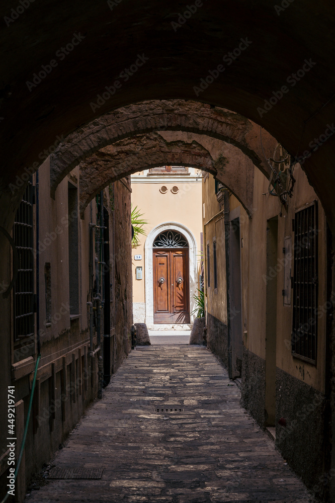 narrow alley in the oldtown of Orbetello