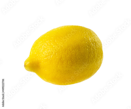 Whole fresh lemon close-up isolated on white background.