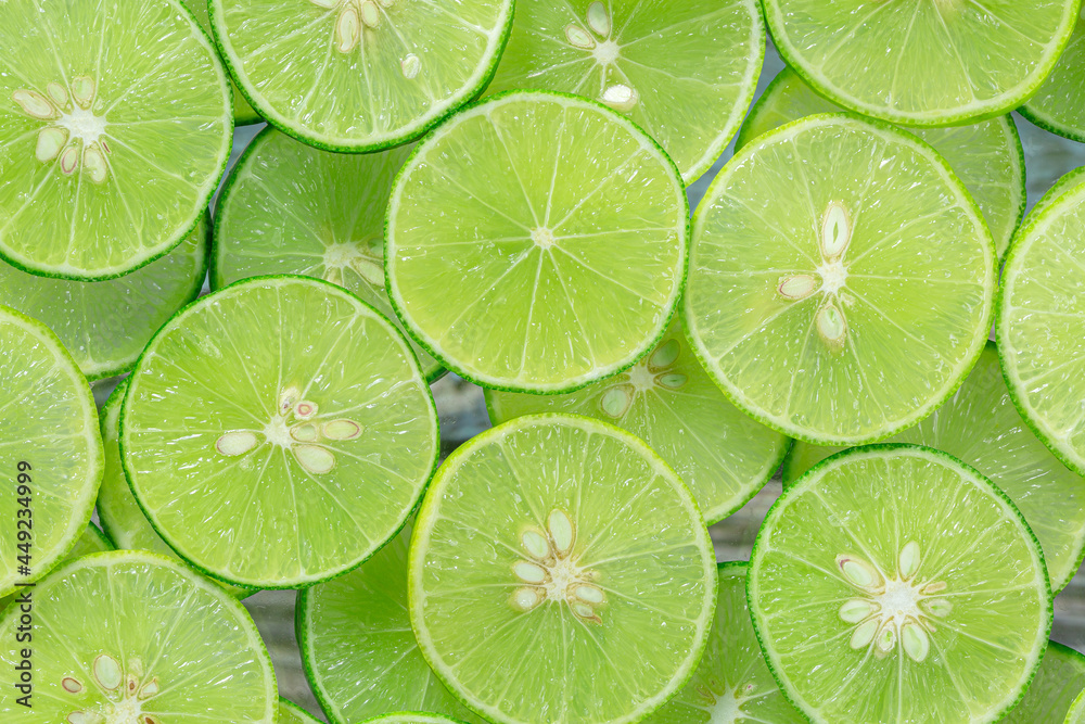 Macro Lime,Fresh lime slices as a background.