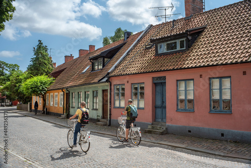 Lund, Sweden - July 2021: Characteristic Strolling streets and alleys with old Picturesque Buildings in downtown of Small travel friendly Town Lund In Skane, Sweden.