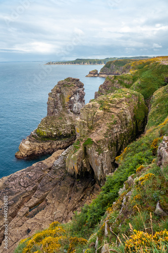 Coast near the Phare Du Cap Frehel is a maritime lighthouse in Cotes-d´Armor (France). At the tip of Cap Frehel