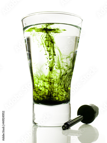 Liquid Chlorophyll in Water isolated on white Background