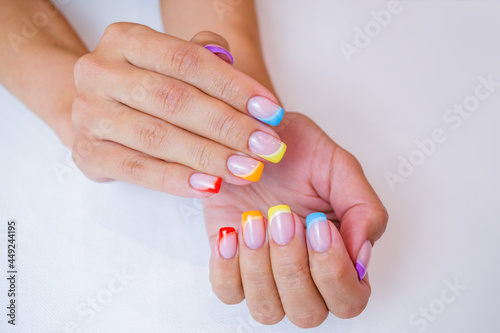 Fotografie Hands of a young woman with a manicure