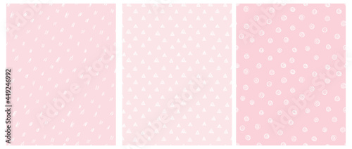 3 Cute Abstract Geometric Vector Patterns. White Hand Drawn Spots, Triangles and Dots Isolated on a Pastel Pink Background. Irregular White Scribbles Print. White Polka Dots on a Pink. Dotted Layout.