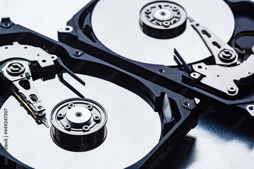 two open computer hard drives for repair. Data safety concept. two open computer hard drives for repair. Data safety concept.