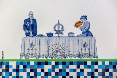 Antigo painel de azulejos com representaçõesd das cerimónias das Festas do Divino Espírito Santo na Ilha Terceira, Açores photo