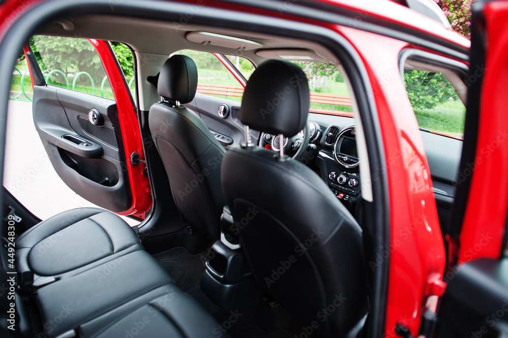 Interior of red city car. Small car for cities.