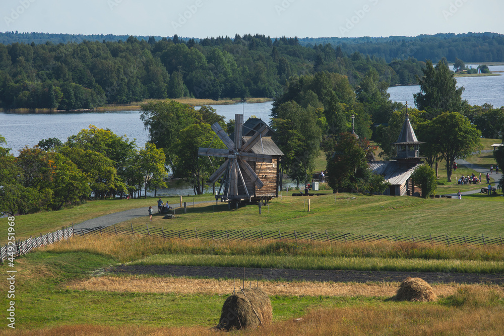 Fototapeta premium Kizhi Island and Kizhi Pogost wooden church open-air museum, summer vibrant view of Onega Lake, Medvezhyegorsky District, Republic of Karelia, Russia