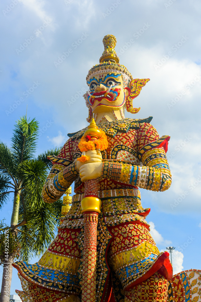 Close-up Statue of Vaiśravaṇa as the guardian at the Pillar Shrine Udon Thani province, Thailand. Vaiśravaṇa is The Seal of Udon Thani