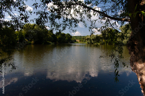 YASNAYA POLYANA. TULA REGION. RUSSIA - July 27, 2021: The manor house pond in the summer.
