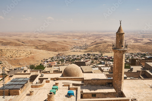 Panoramic view of Mardin Sanitary historical Emir Hamam baths, city roofs and Mesopotamian plain. South-eastern part of Turkey. 