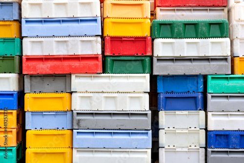 colorful plastic crates for transport and storage of fresh fish