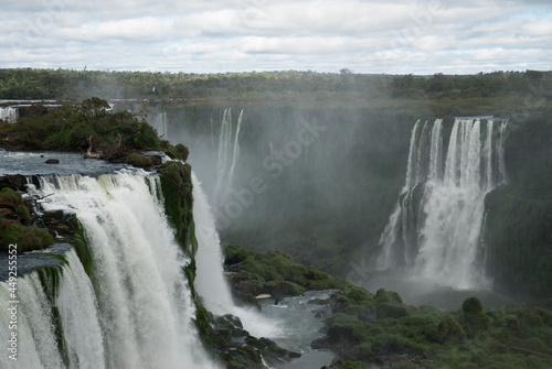 seeing from afar waterfall in the mountains and rainbow Cataratas do Igua  u Parana Brazil