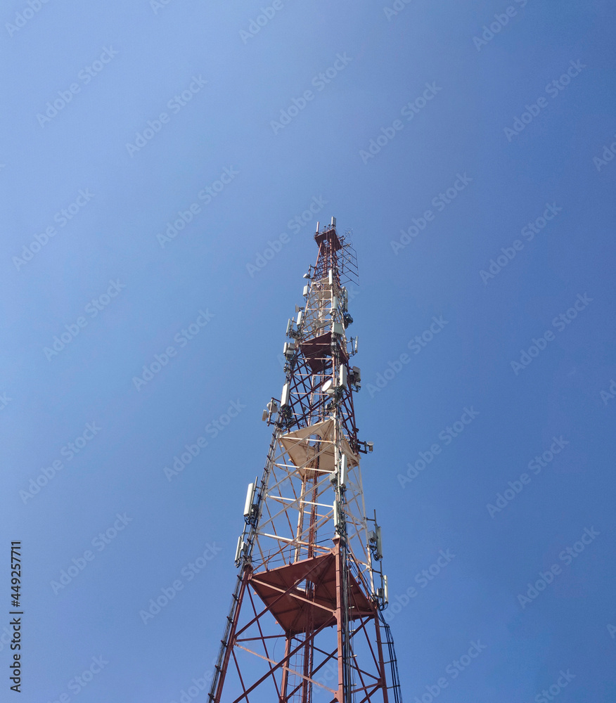 base station of cellular communication against a blue sky base station of cellular communication against a blue sky