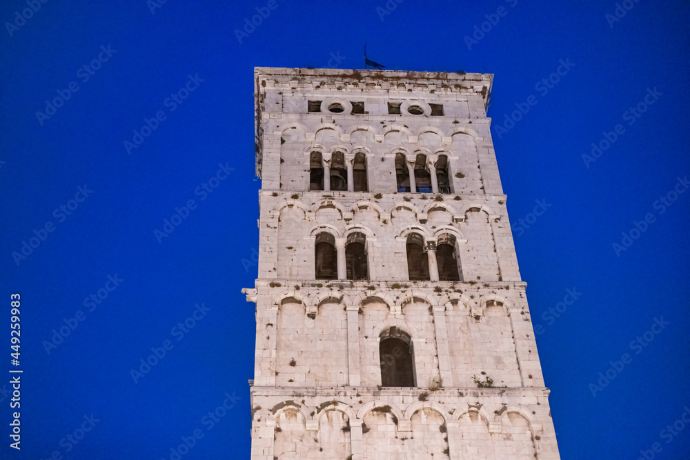 St Michael Tower at night in Lucca, Italy.