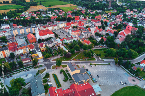 Fototapeta Naklejka Na Ścianę i Meble -  Small town in Europe, aerial view. Residential buildings and streets in small city