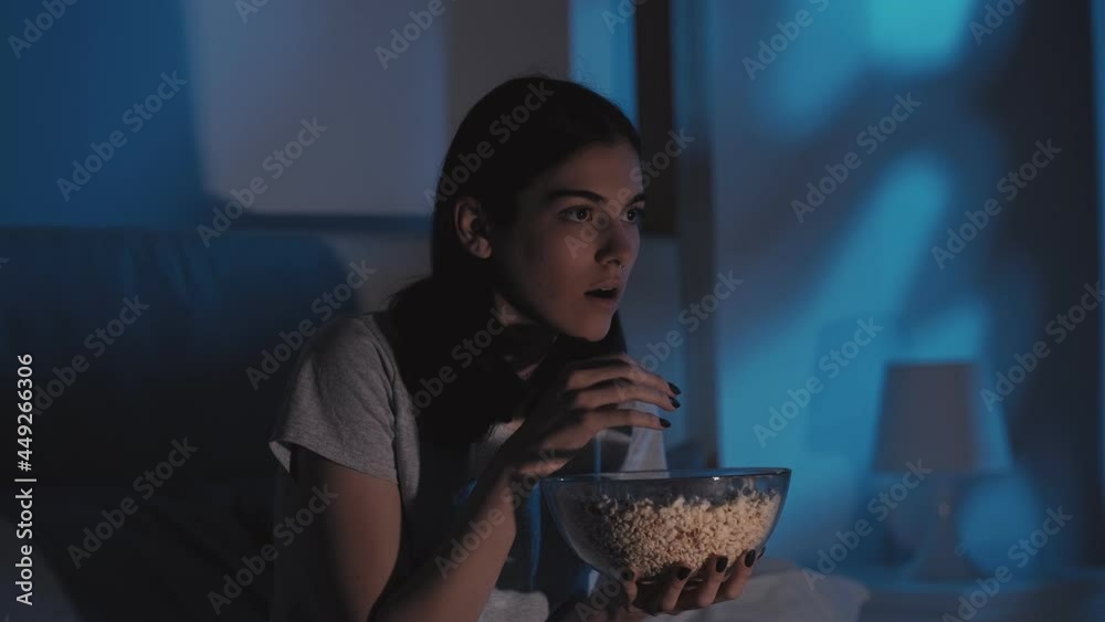 horror movie night television scared woman popcorn
