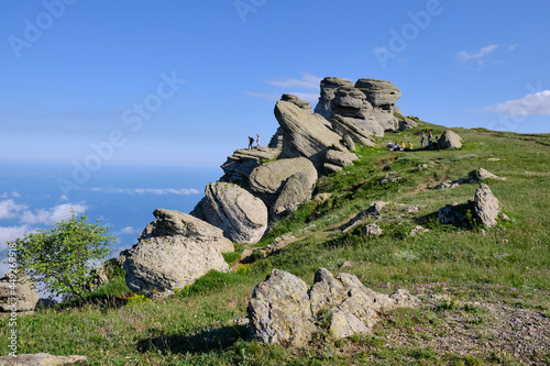 Tourists on the rocks of Mount Alenga. Seaside mountains, Demerdzhi mountain range, Crimea. © Алексей Ожегин